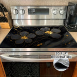Protector decorativo para estufa – flor negra y dorada